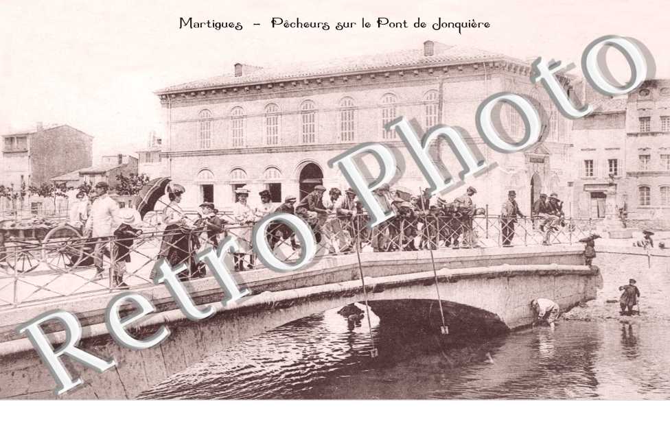 pecheurs au trident sur le pont de jonquiere