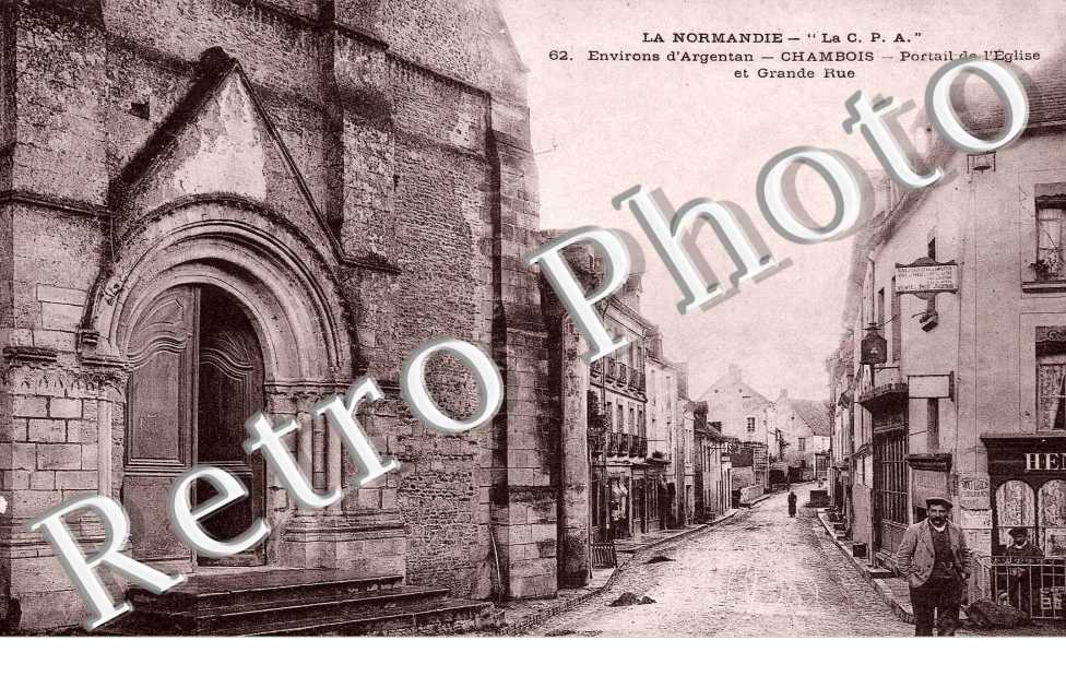 n°62. Portail de l&#039;eglise et grande rue.
