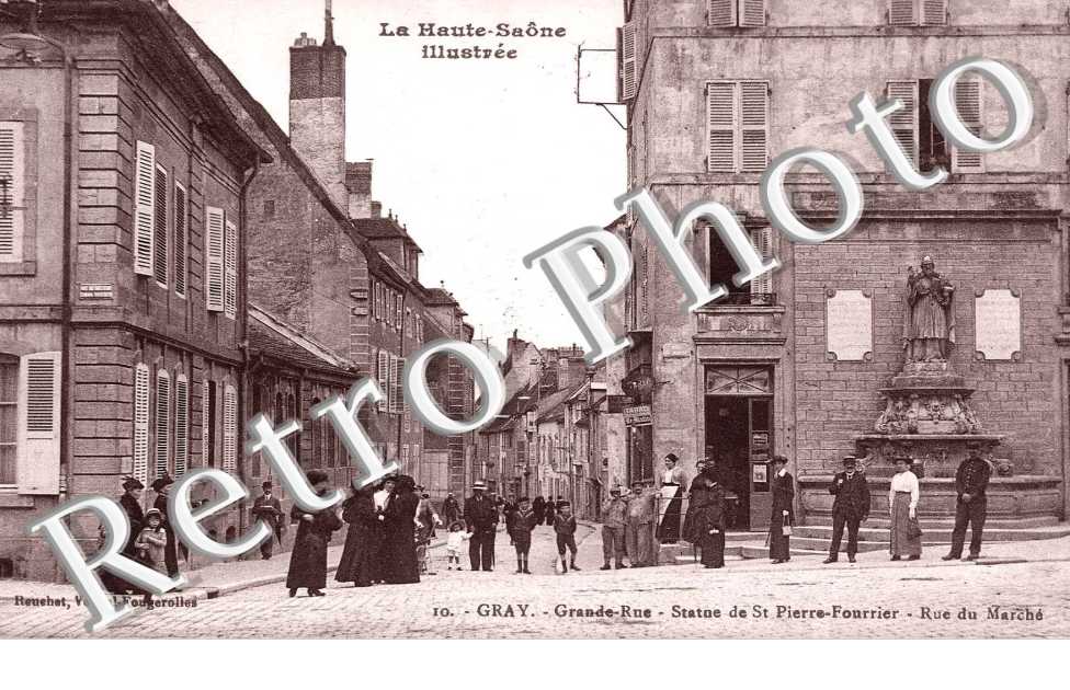Grande Rue. statue de St Pierre Fourrier. Rue du marche