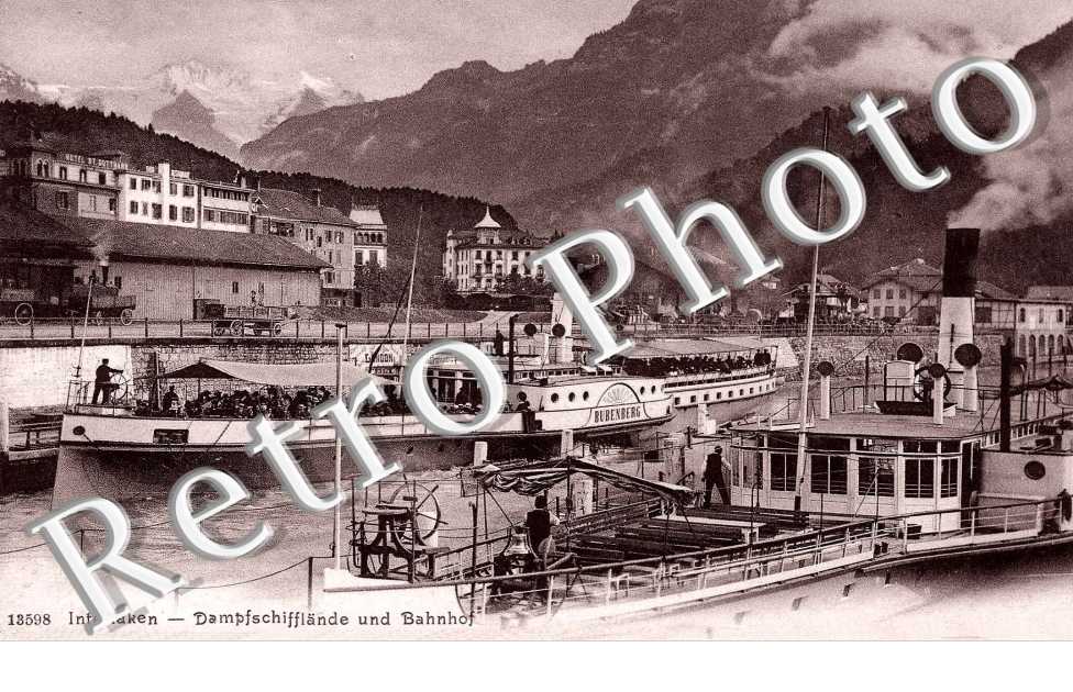 Dampfschifflande und bahnhof. Les bateaux a vapeur et la gare