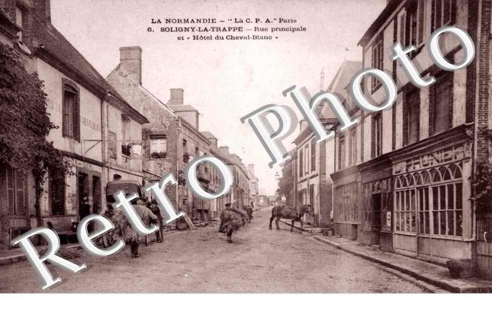 rue principale et hotel du cheval blanc