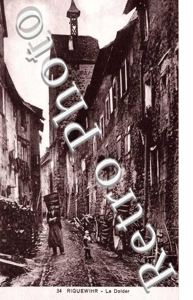 le Dolder - Vendangeurs portant leur hotte