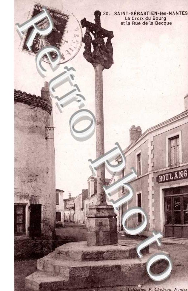 la croix du bourg et rue de la Becque