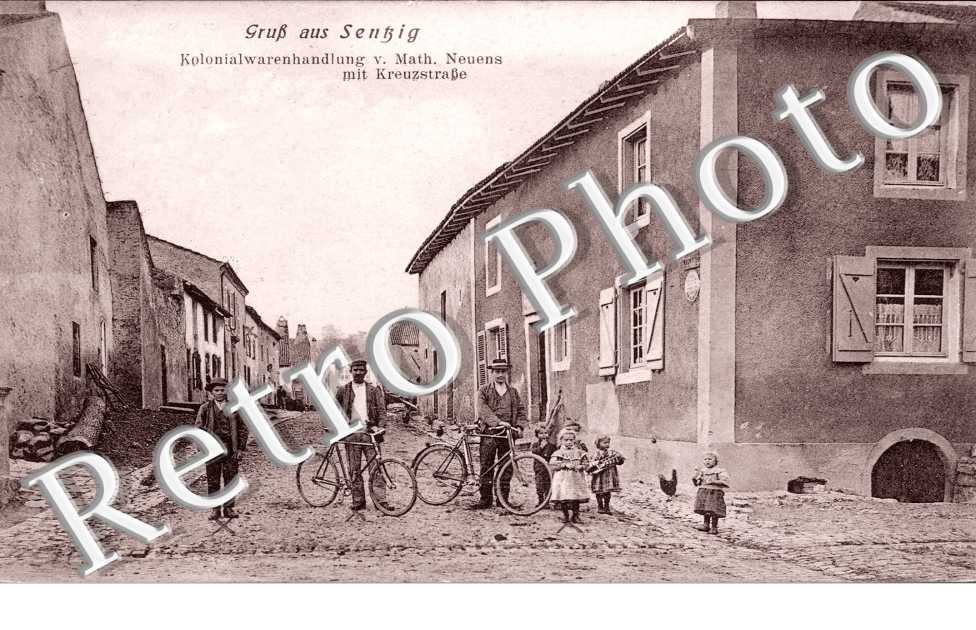 gruss aus Sentzig kolonialwarenhandlung v . Math. Neuens mit Kreuzstrasse