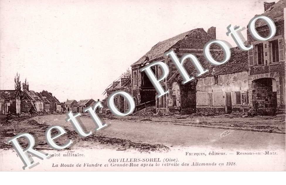 La route de Flandre et grande rue apres la retraite des Allemands en 1918