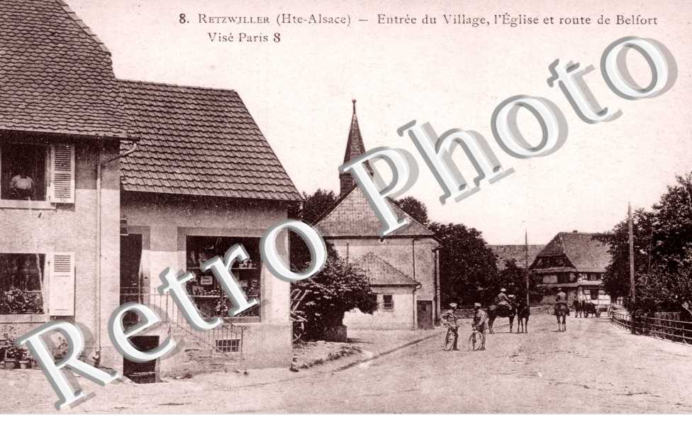 entree du village, l&#039;eglise et route de Belfort