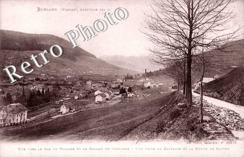Vue vers le Bas du Village et le Ballon de Servance, Vue prise du Calvaire et la Route de Sautey