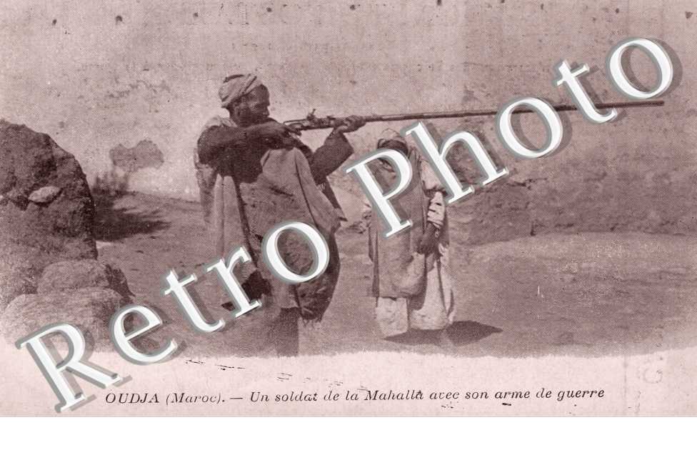 Un soldat de la Mahalla avec son armes de guerre