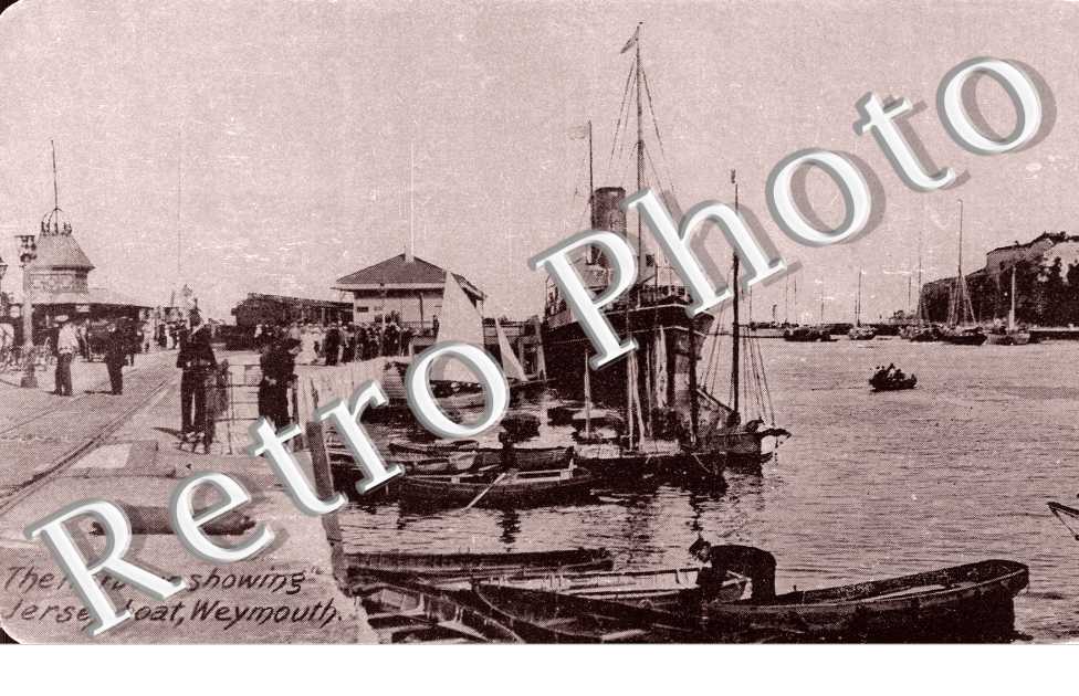 the Harbour showing Jesery Boat