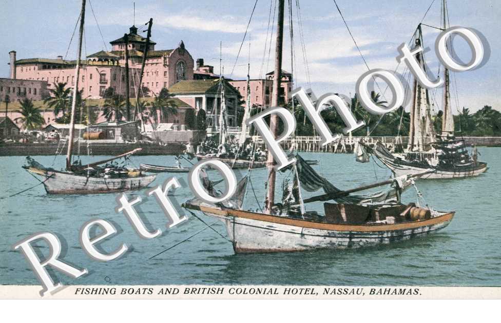 Fishing boats and british colonial hotel