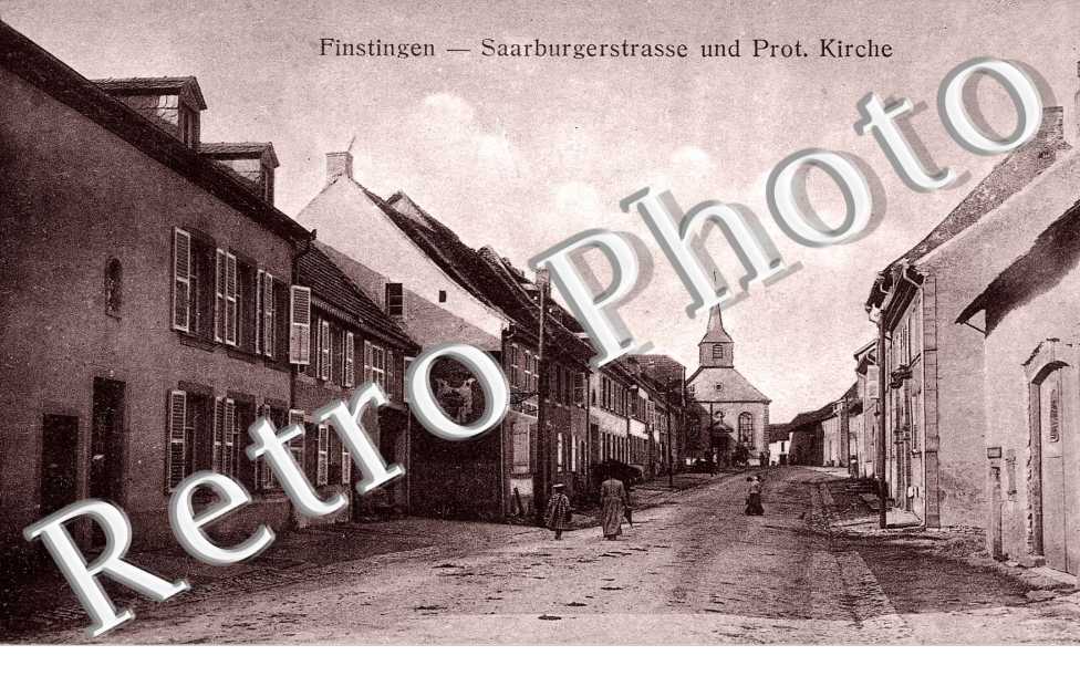 Finstingen - Saarburgerstrasse und Prot. Kirche