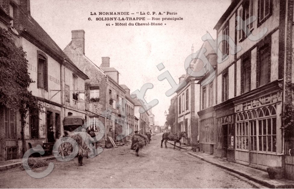 rue principale et hotel du cheval blanc