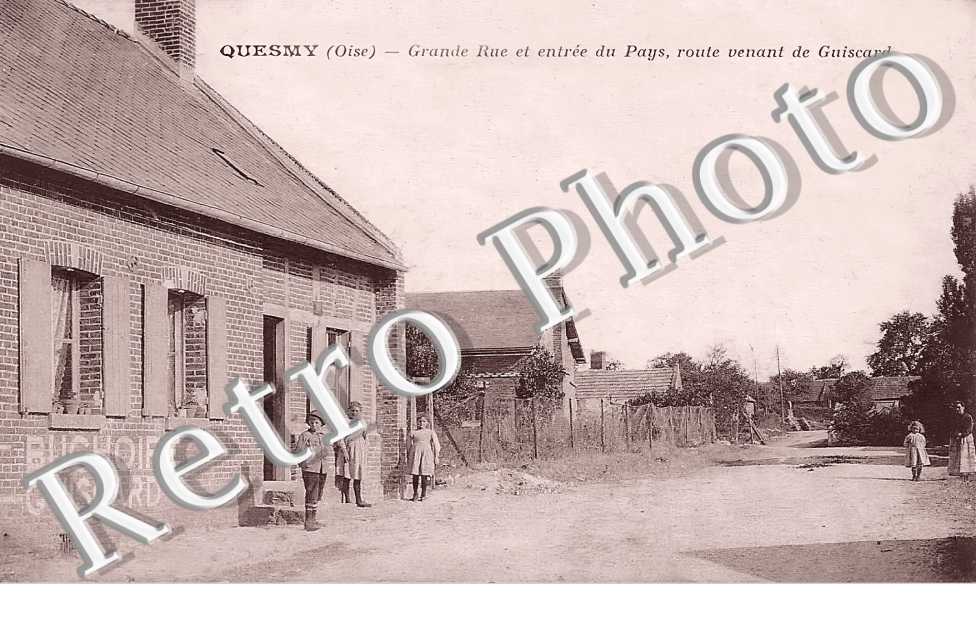 grande rue et entrée du pays, route venant de Guiscard