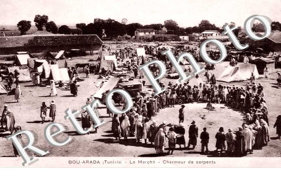 le Marché. Charmeur de serpents