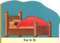 sur le lit