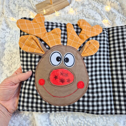 Livre de noël en tissu.