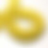 Fil 39cm 100pc env - perles de pierre turquoise synthèse rondelles 6x4mm jaune