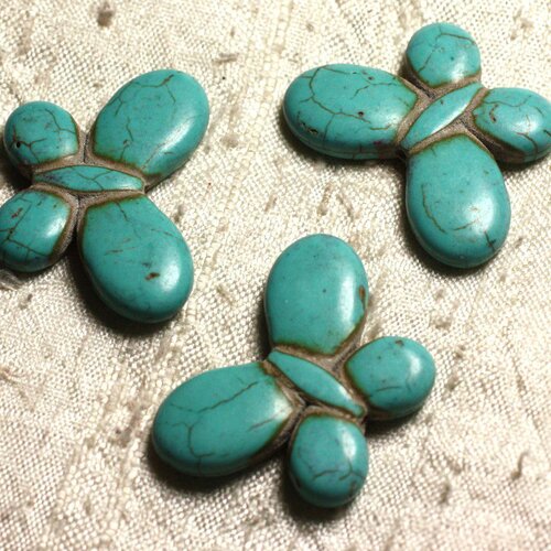 4pc - perles turquoise synthèse papillons 35x25mm bleu turquoise   4558550012081