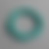 Bracelet élastique perles incurvées vert turquoise