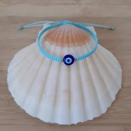 Bracelet macramé bleu, perles oeil et argentées