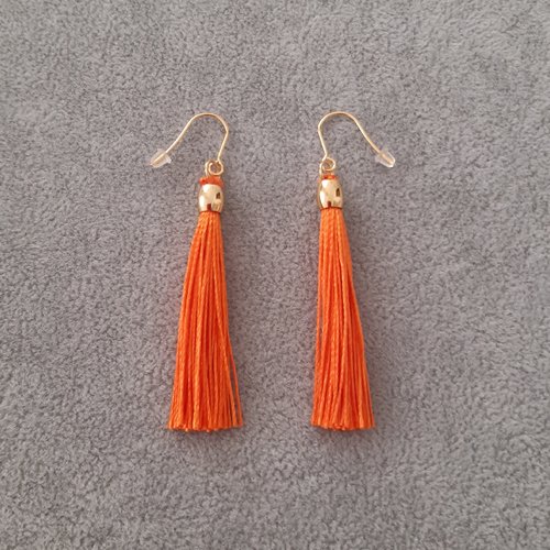 Boucles d'oreilles dorées pompons oranges