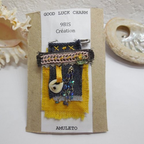Broche amulette de bienveillance