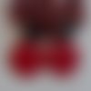 Boucles d'oreilles longues rondes motif tricot rouge et noir en pâte polymère