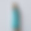 Pompon suédine uni 60 mm n°40 turquoise