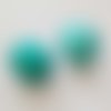 Perle brillante ovale plate turquoise 23 mm