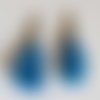Pompon mousqueton 45 mm bleu clair