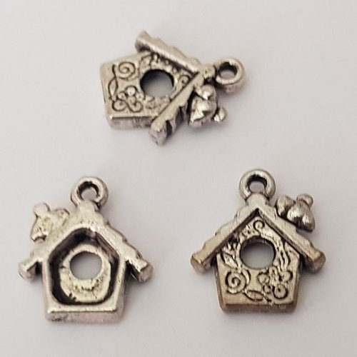 Breloque oiseau nid en métal argent n°32-02