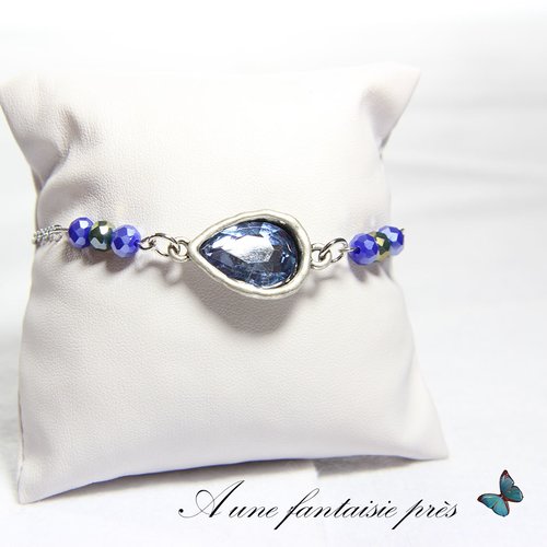 Bracelet argenté goutte d'eau et perle bleu