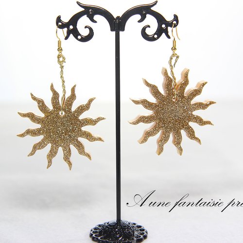 Boucle d'oreille doré soleil pailleté