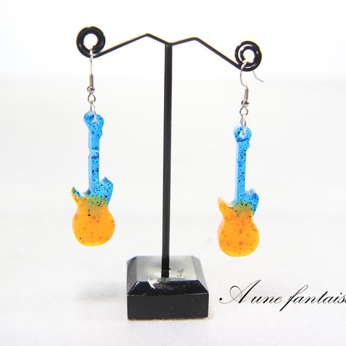 Boucle d'oreille argenté guitare