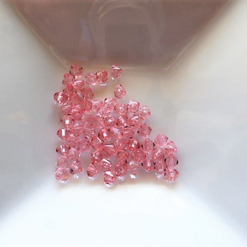 60 perles toupies bi cône acrylique 4 mm vieux rose translucide