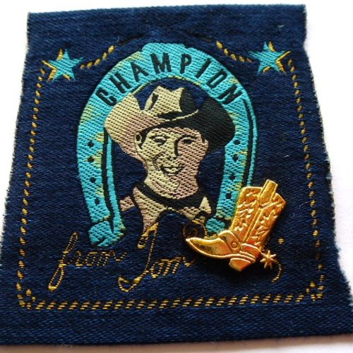 Applique champion avec santiage en métal doré 7.5 x 7 cm