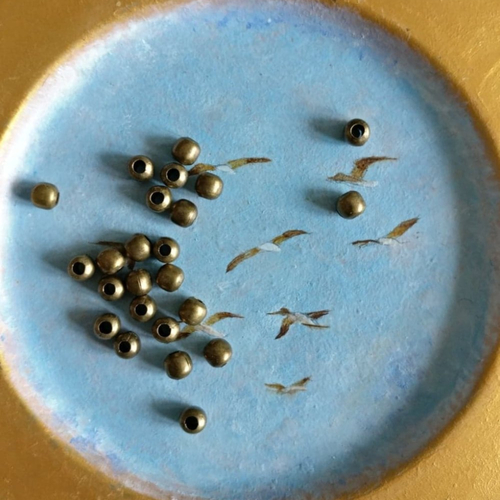 Lot de 20 perles à gros trou en laiton bronze antique de 5 mm de diamètre extérieur.