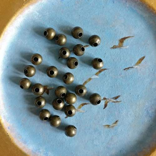 Lot de 20 perles à gros trou en laiton bronze antique de 6 mm de diamètre extérieur.