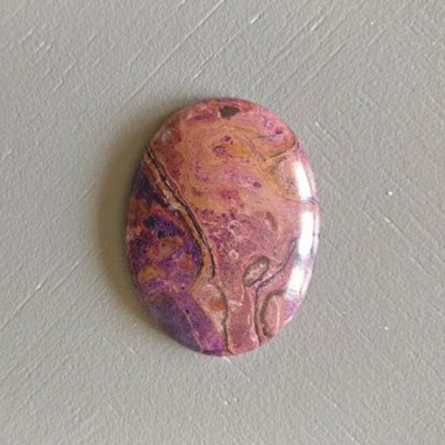 1 cabochon veiné purple en pierre naturelle. 40 x 30 mm.
