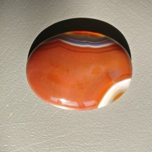 1 cabochon d' agathe veinée orange en pierre naturelle. 40 x 30 mm.