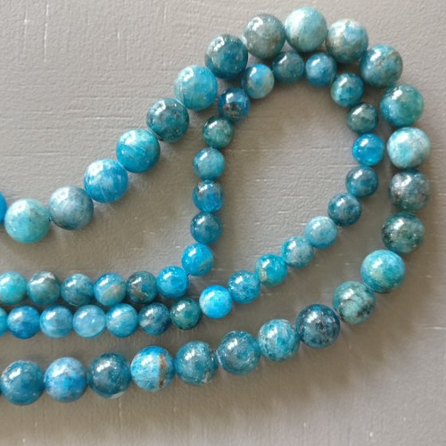 Lot de 10 perles d'apatite bleu rondes en pierre naturelle 6 mm.