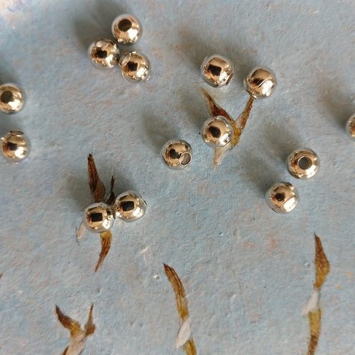 Lot de 20 perles à gros trou rhodium de 3 mm de diamètre extérieur.