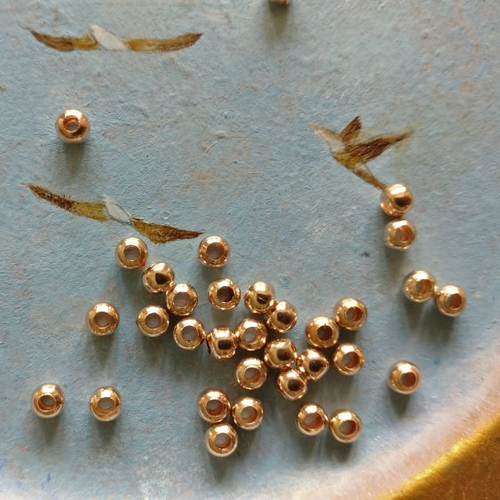 Lot de 20 perles à gros trou métal rose gold de 3 mm de diamètre extérieur.