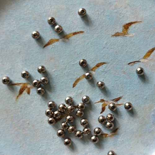 Lot de 20 perles à gros trou gunmétal de 3 mm de diamètre extérieur.
