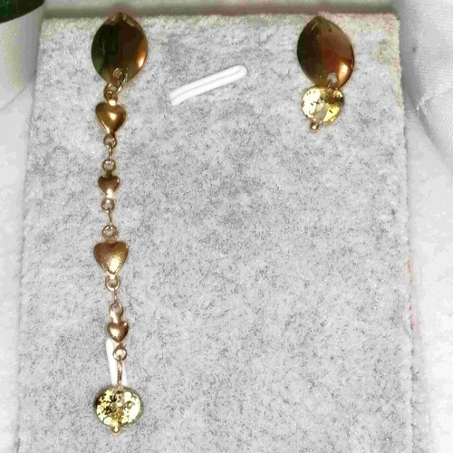 Boucles d'oreilles assymétriques