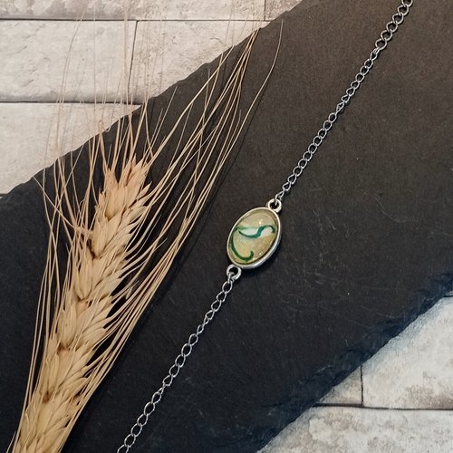 Bracelet avec chaine et cabochon "flore"