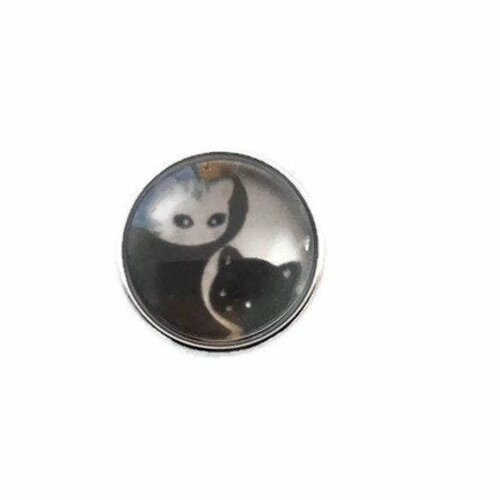 Bouton pression 18mm à motif yin yang et chats noirs et blanc.