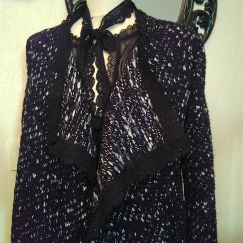 Gilet en maille chinée de couleur noir et blanc 