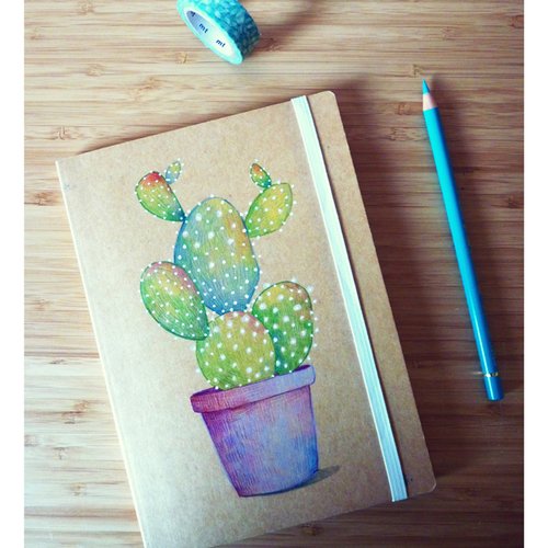 Carnet moleskine en kraft, décoré à la main.