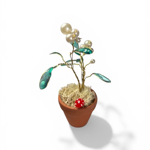 Fleurs en résine dans un pot en terrocotta